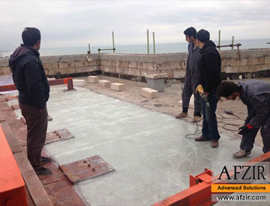 Strengthening-concrete-slab-with-FRP-fibers-in-the-residential-tower-of-Mazandaran-project-strengthening-afzir-533x400