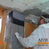 staturating cfrp fabric with epoxy based paste- Afzir Retrofitting Co.